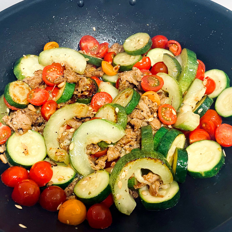 When zucchini and squash get a little brown, add earlier prepared SoMeat and cherry tomatoes.