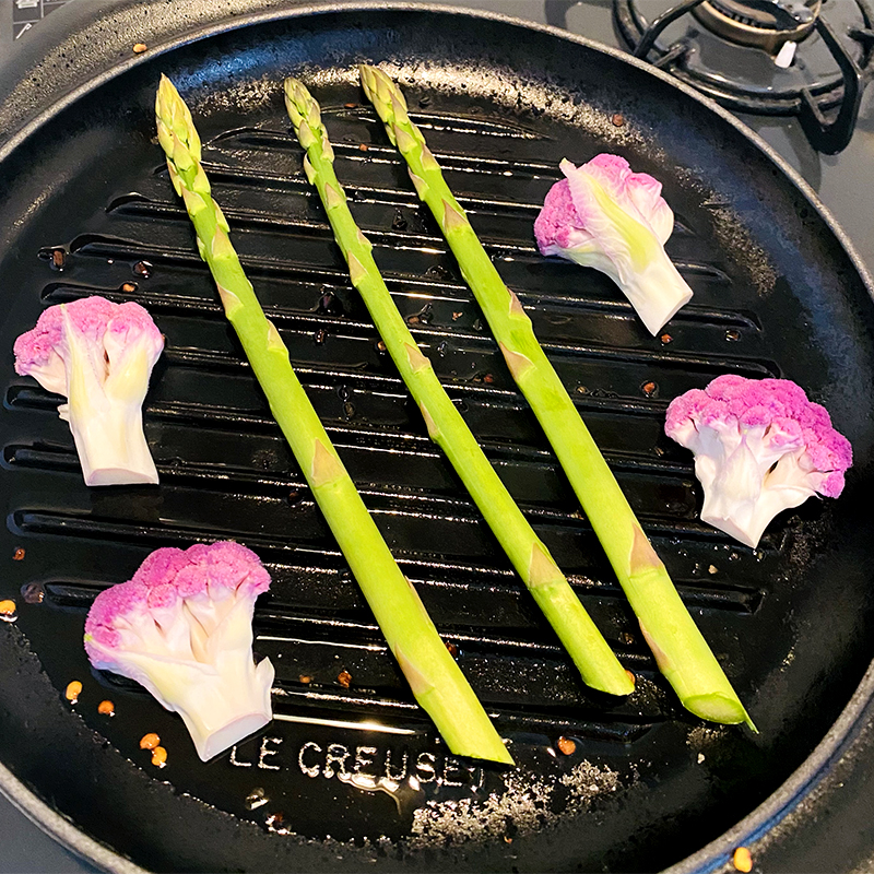 Grill asparagus and cauliflower halves.