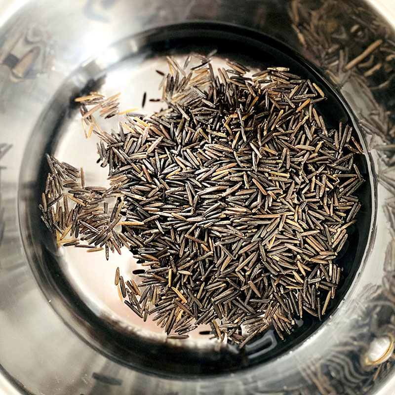 Cook the wild rice for about 30 min over a low heat, covered. ( 1/2 cup of wild rice with 1.5 cups of water)