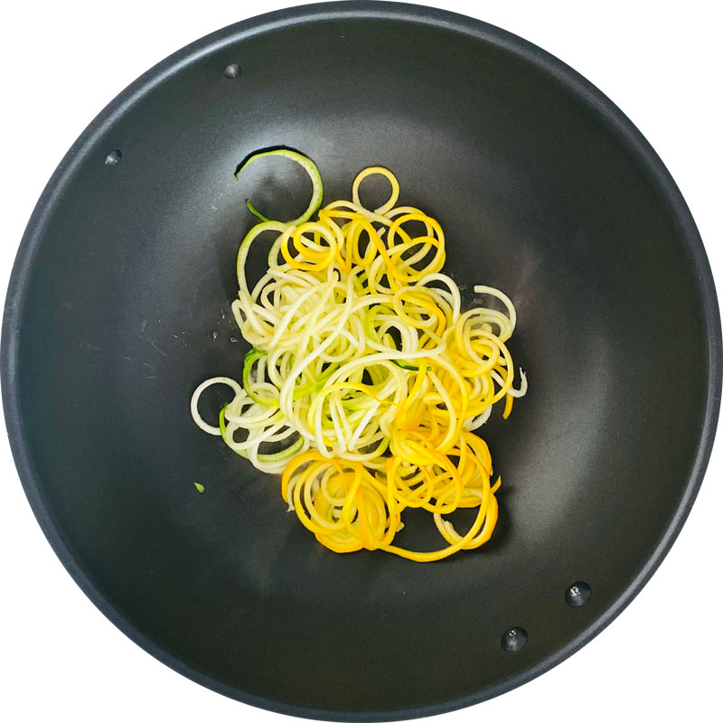 Spiralise zucchini to make zoodles and sauté it.