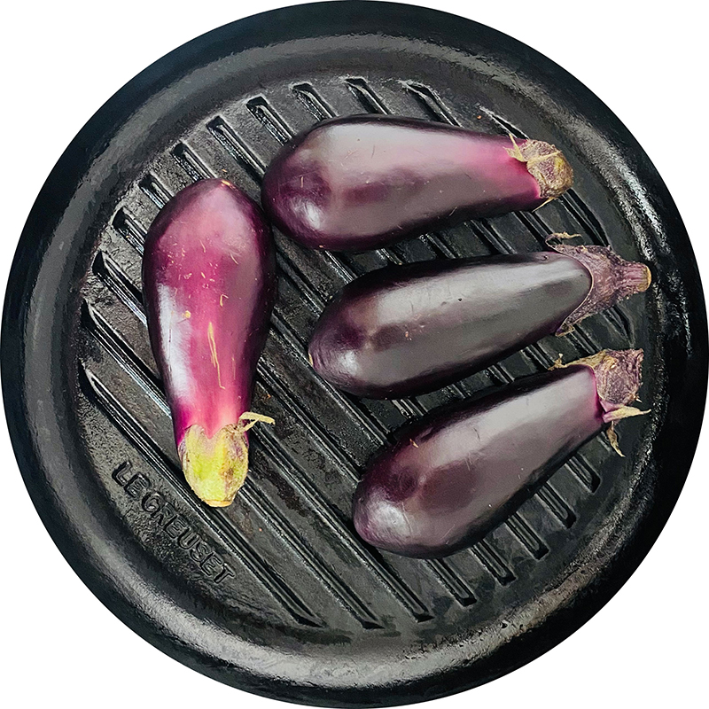 First, cut the eggplant into halves and grill or bake until soft. (about 10 min)
