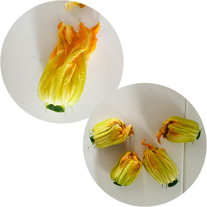 Separa las flores de los calabacines. Quita los pistilos más duros y rellena con cuidado las flores con la mezcla de carne picada. Corta los calabacines en rodajas.